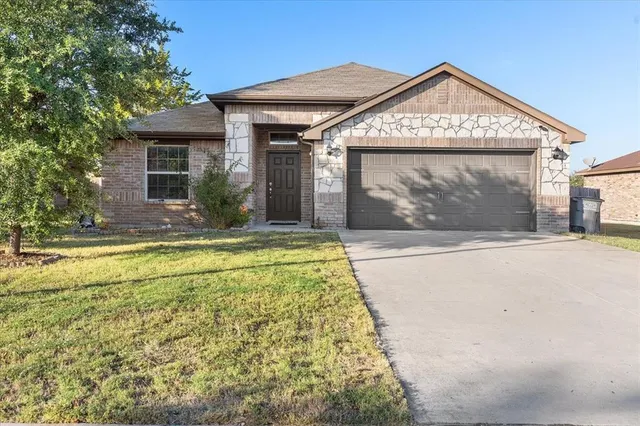 a view of a house with a swimming pool