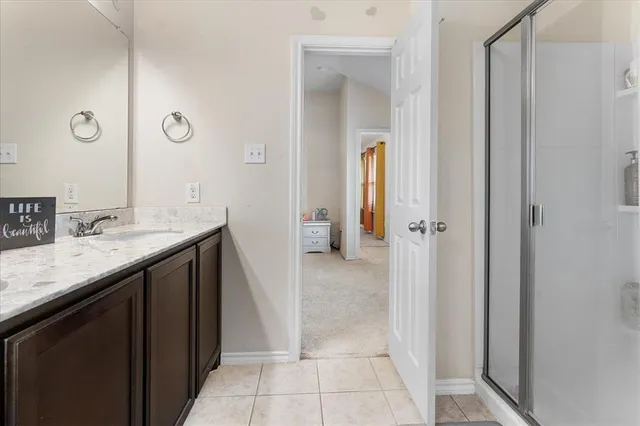 a white bath tub sitting next to a window