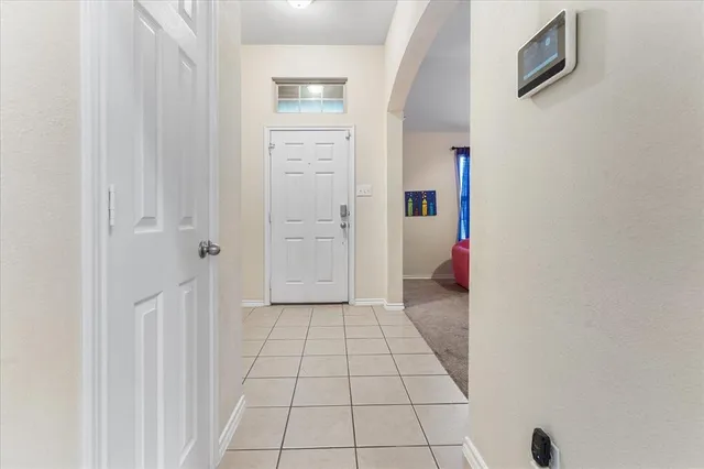 a view of an entryway with a workspace