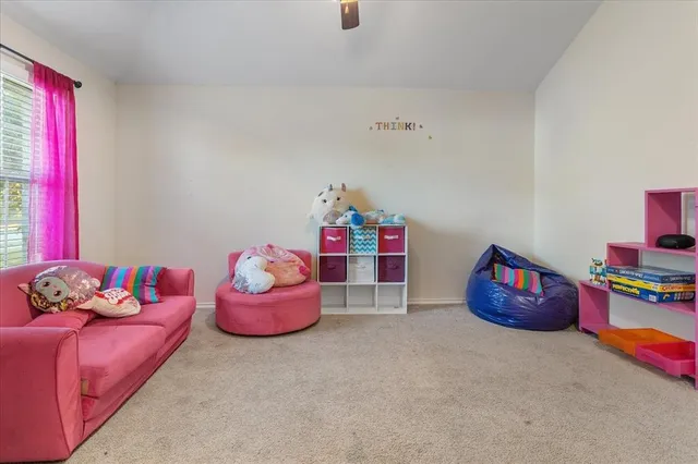 a bedroom with furniture and a couch