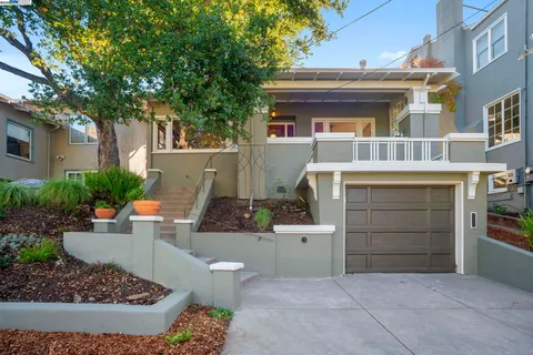 a view of a house with a tub and a fire pit