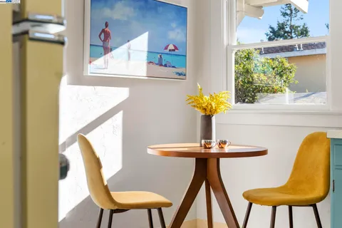 a kitchen with a sink stove and refrigerator