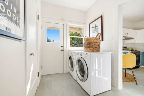 a bed room with a bed and a window