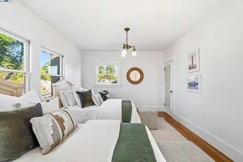a view of backyard with outdoor seating and green space