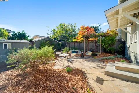 an aerial view of a house with a garden