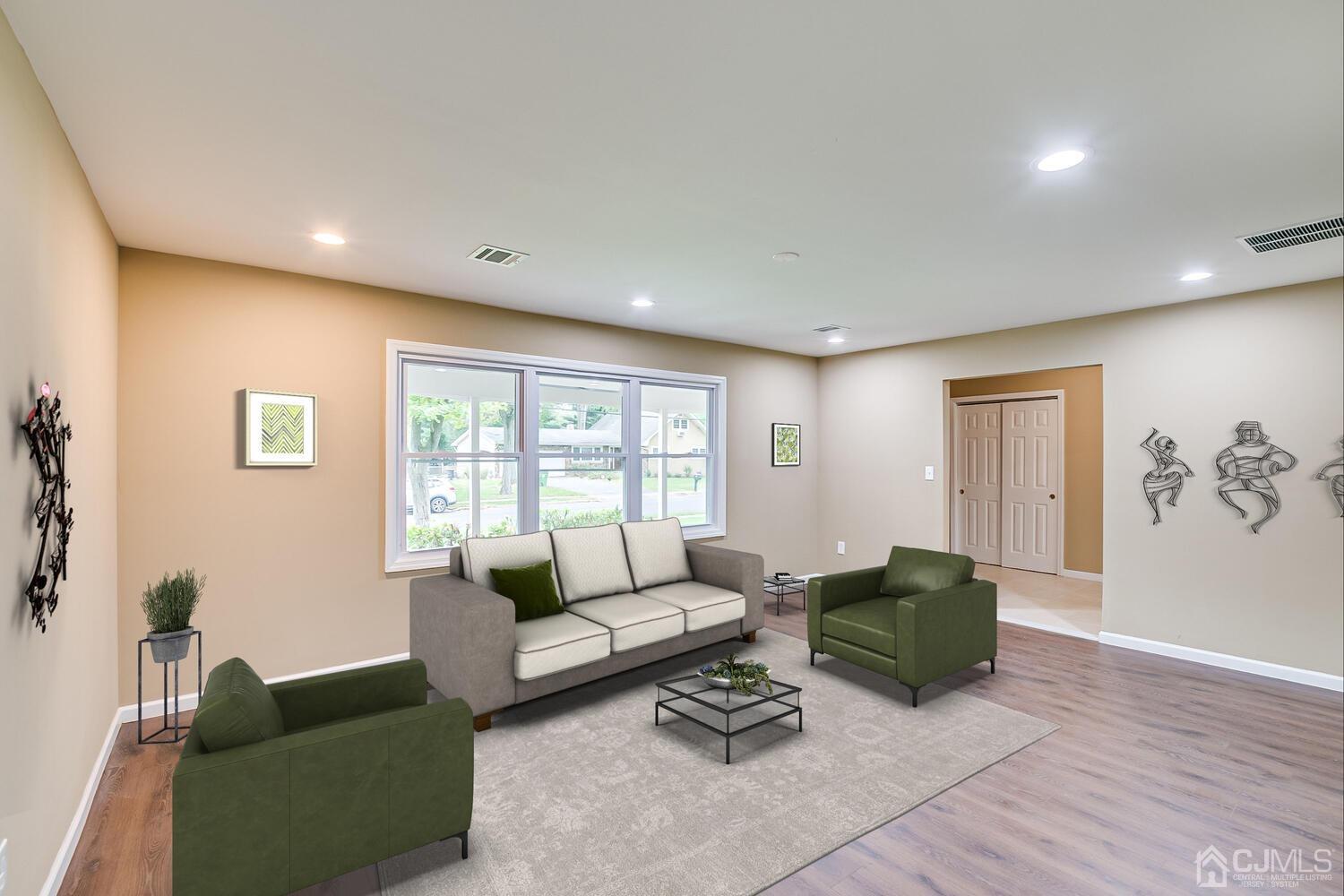 1 Lynnwood Road Edison, NJ 08820 - Photo 12 of 41 a living room with furniture and a window