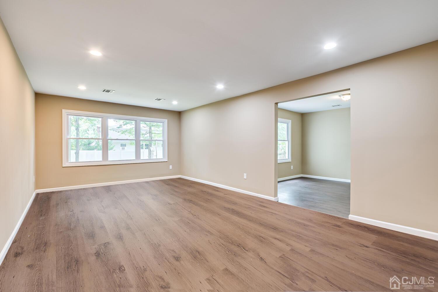 1 Lynnwood Road Edison, NJ 08820 - Photo 26 of 41 an empty room with wooden floor and windows