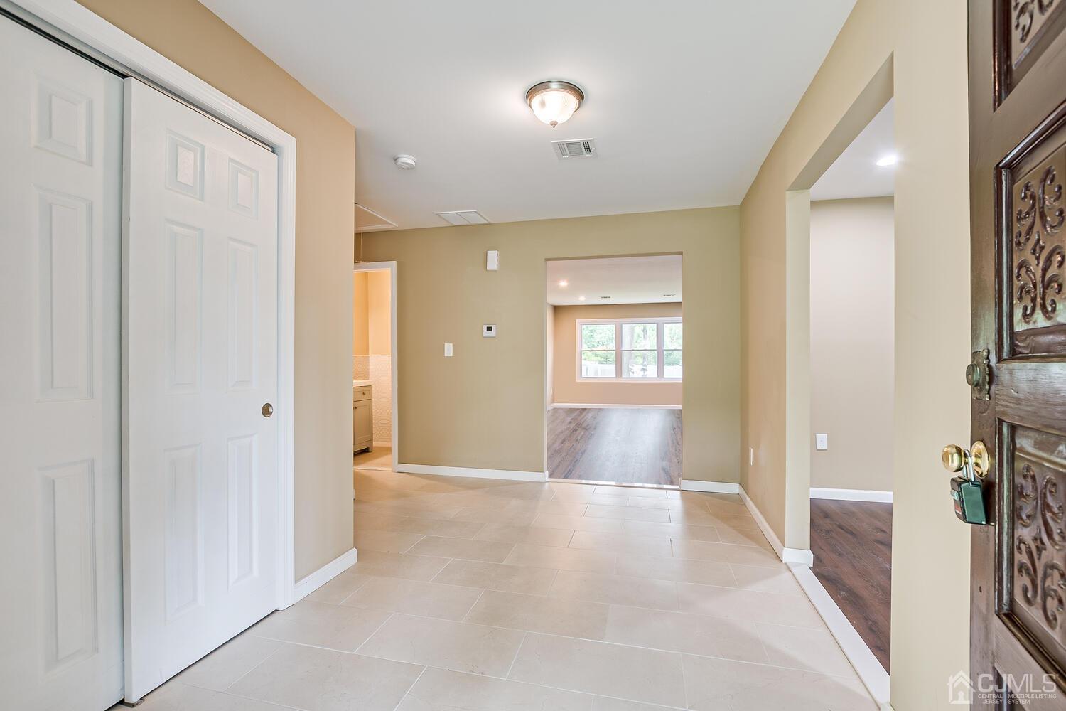 1 Lynnwood Road Edison, NJ 08820 - Photo 6 of 41 a view of a hallway with furniture and a window