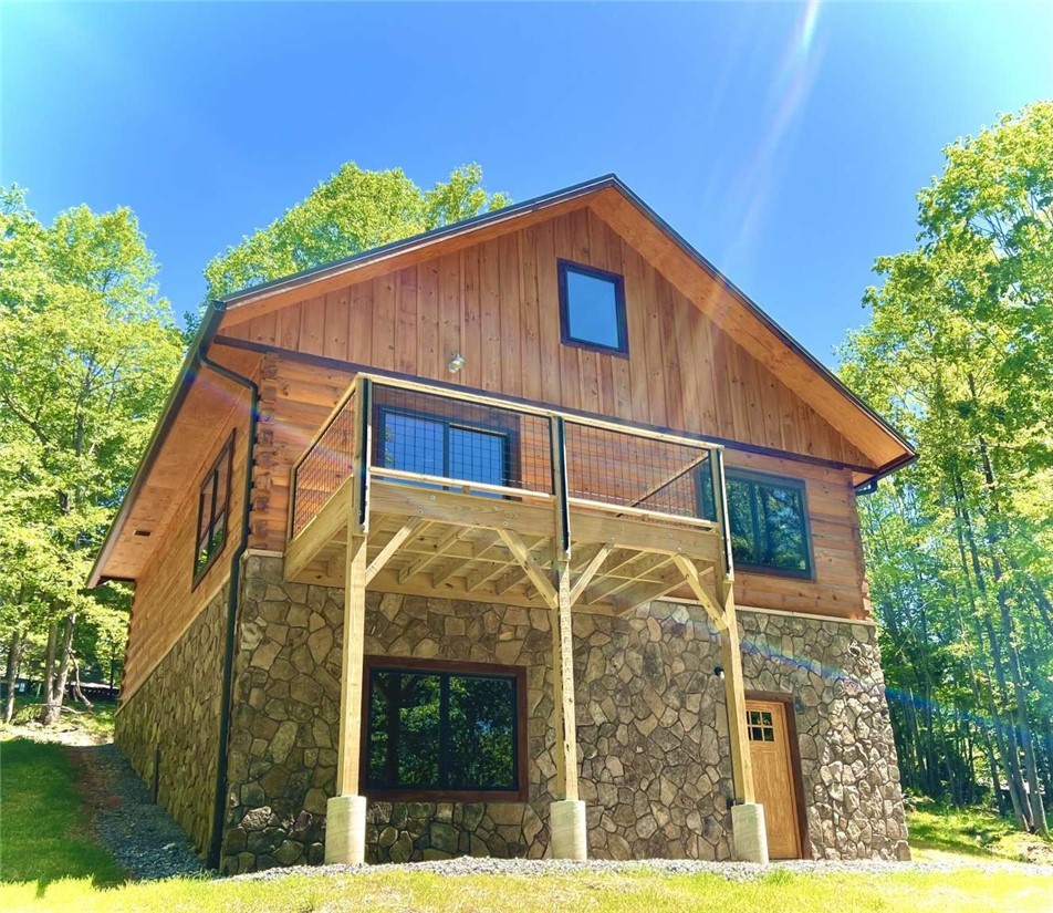 138 Talon Drive Boone, NC 28607 - Photo 2 of 25 a backyard of a house with large trees