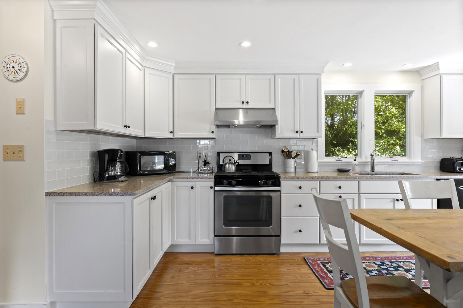 19 Katama Drive Edgartown, MA 02539 - Photo 5 of 17 a kitchen with stainless steel appliances granite countertop a stove a sink and a refrigerator