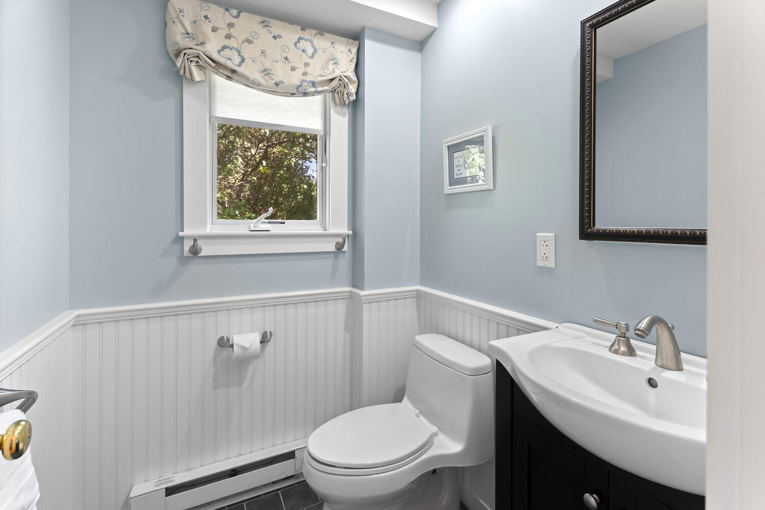 19 Katama Drive Edgartown, MA 02539 - Photo 9 of 17 a white toilet sitting next to a bathroom sink