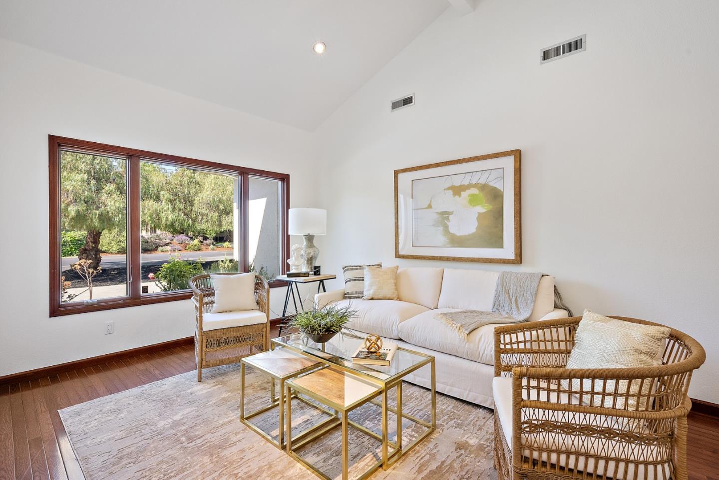 425 Covington Road Los Altos, CA 94024 - Photo 16 of 65 a living room with furniture a table and a large window
