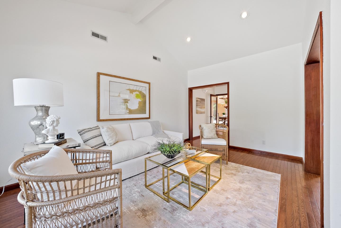 425 Covington Road Los Altos, CA 94024 - Photo 17 of 65 a living room with furniture a rug and a lamp
