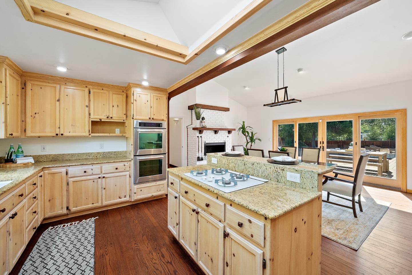 425 Covington Road Los Altos, CA 94024 - Photo 23 of 65 a kitchen with stainless steel appliances granite countertop a stove and cabinets