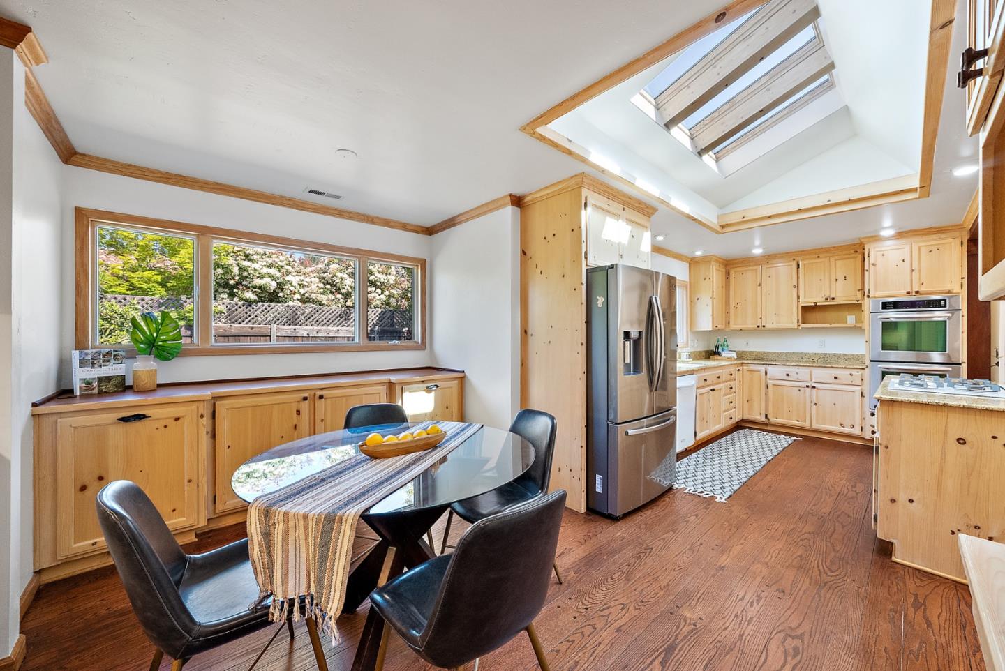 425 Covington Road Los Altos, CA 94024 - Photo 26 of 65 a living room with furniture and a open kitchen view