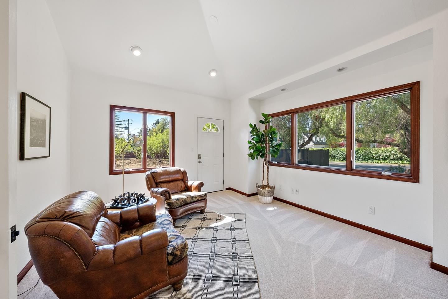 425 Covington Road Los Altos, CA 94024 - Photo 28 of 65 a living room with furniture and large windows