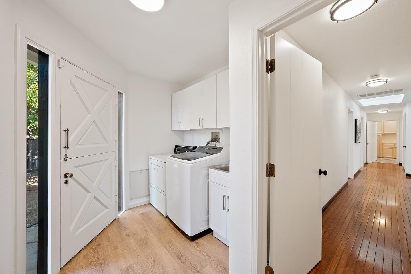 425 Covington Road Los Altos, CA 94024 - Photo 30 of 65 a view of hallway with wooden floor
