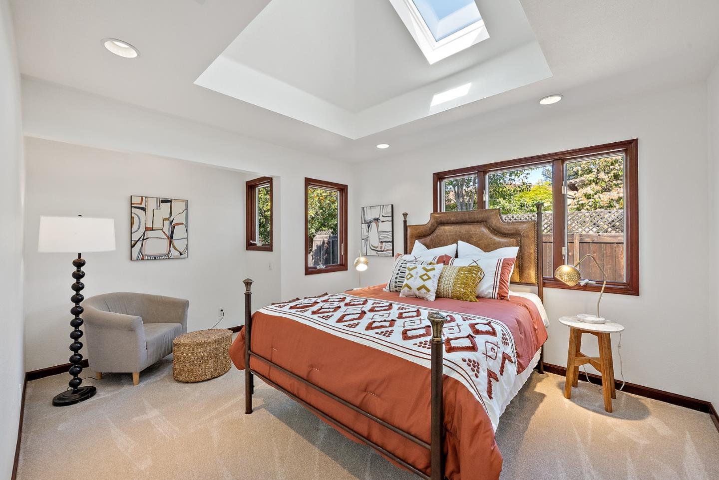 425 Covington Road Los Altos, CA 94024 - Photo 32 of 65 a bedroom with a bed a mirror and a large window