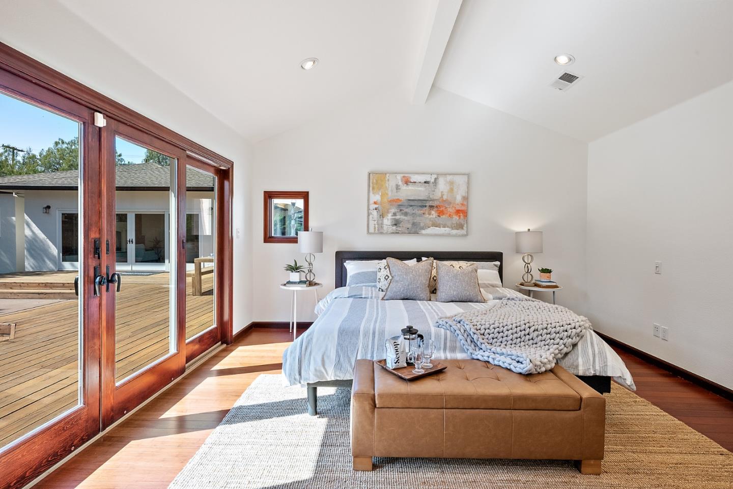 425 Covington Road Los Altos, CA 94024 - Photo 34 of 65 a bedroom with a large bed and a large window