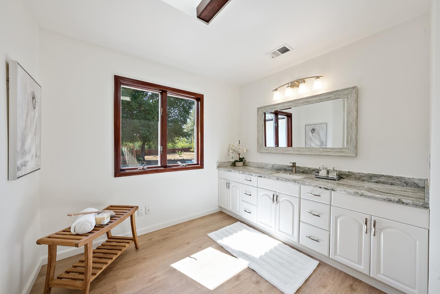 425 Covington Road Los Altos, CA 94024 - Photo 36 of 65 a bathroom with 2 sink tub and a mirror