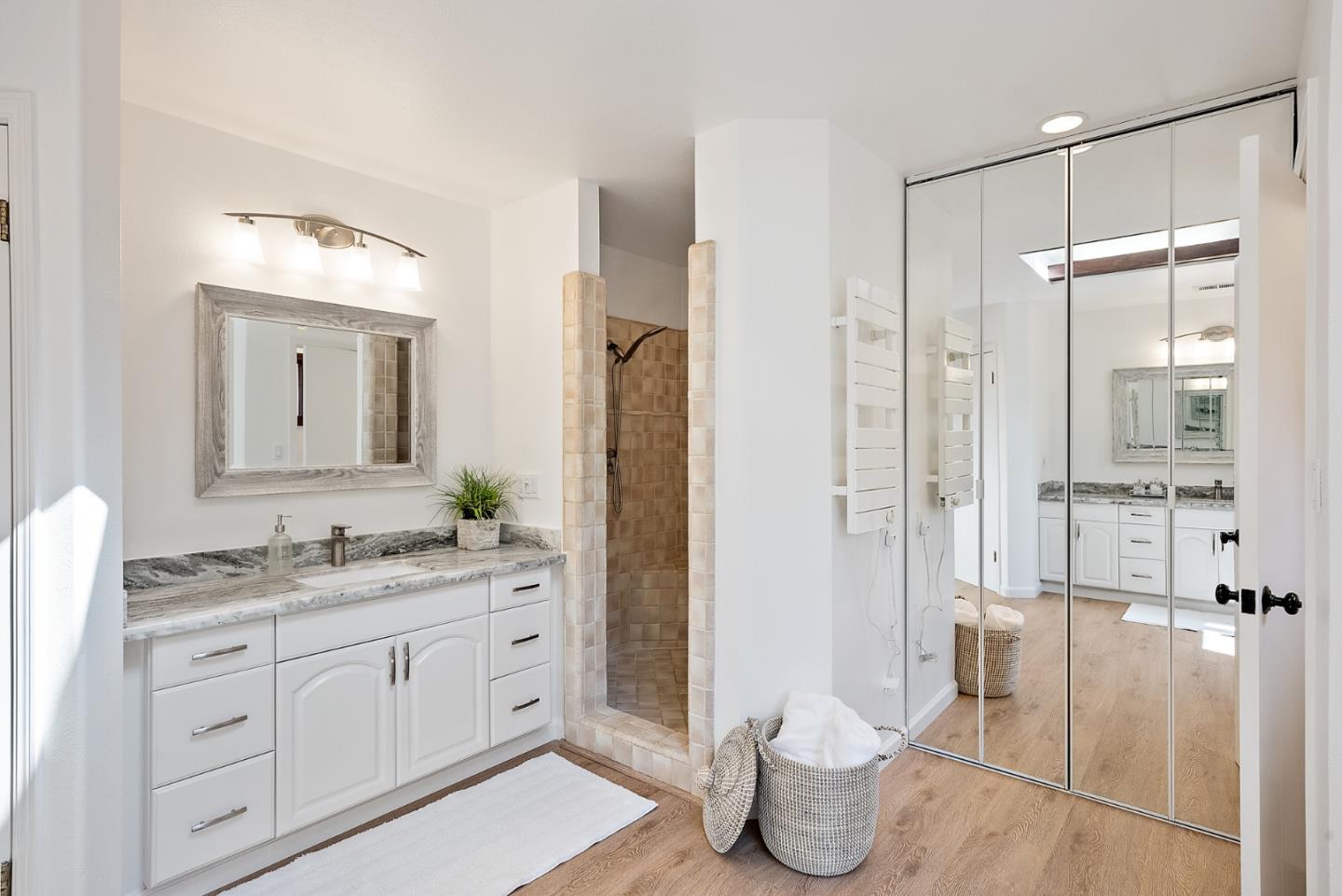 425 Covington Road Los Altos, CA 94024 - Photo 37 of 65 a en suite bathroom with a granite countertop sink mirror and toilet