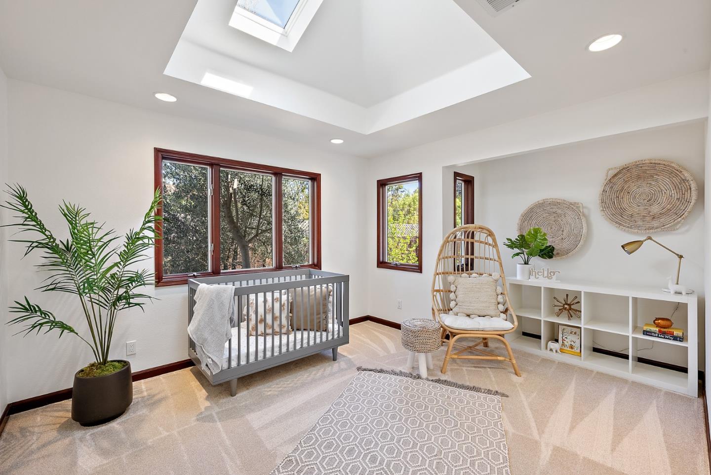 425 Covington Road Los Altos, CA 94024 - Photo 38 of 65 a living room with furniture a window and a potted plant