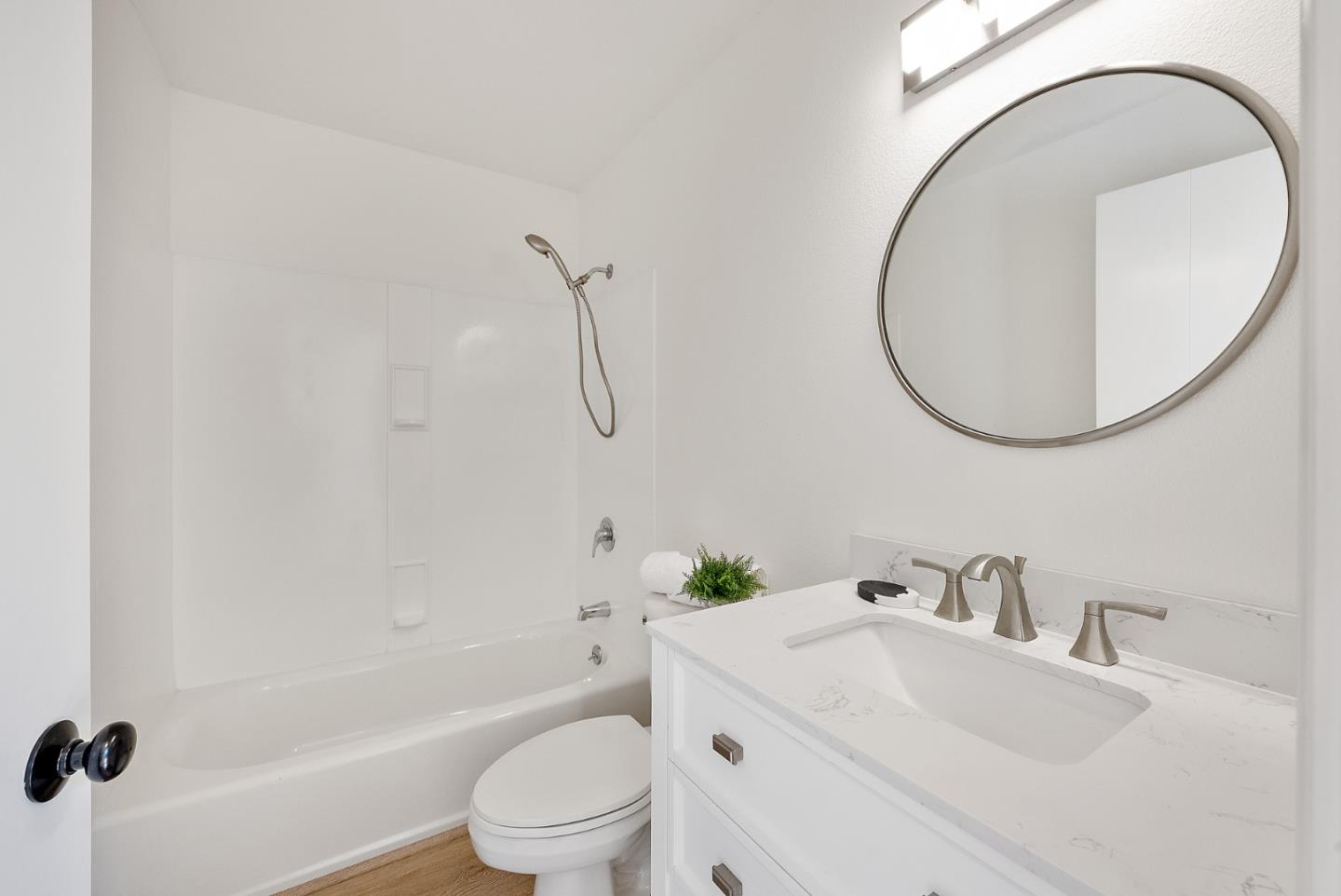 425 Covington Road Los Altos, CA 94024 - Photo 46 of 65 a bathroom with a sink a toilet and a mirror
