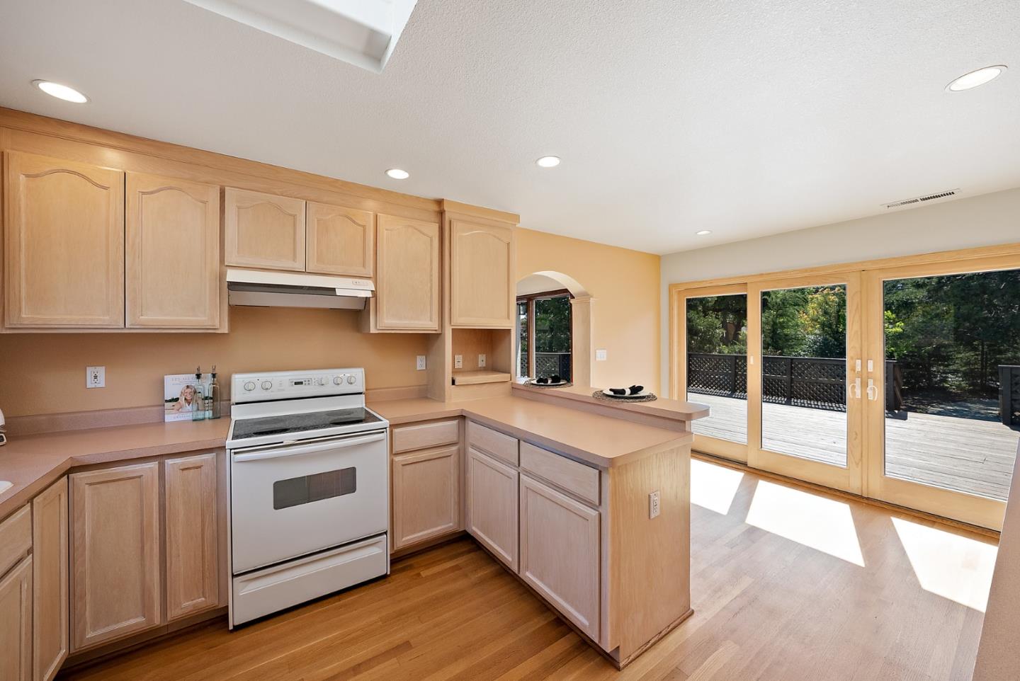 425 Covington Road Los Altos, CA 94024 - Photo 51 of 65 a kitchen with stainless steel appliances granite countertop a stove and a sink