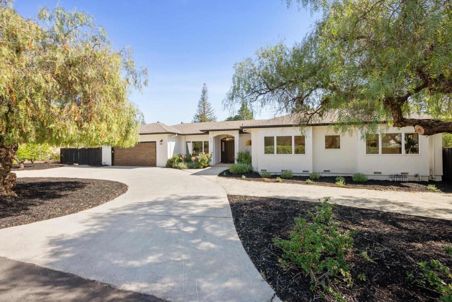 425 Covington Road Los Altos, CA 94024 - Photo 7 of 65 front view of a house with a yard