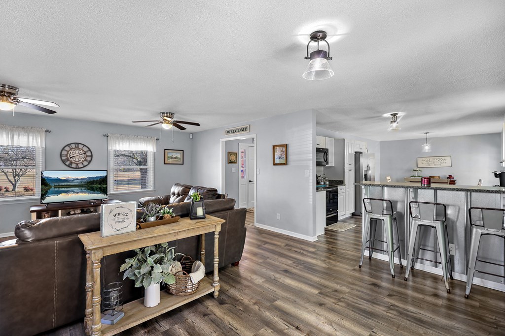 202 Wilton Road Abbeville, SC 29620 - Photo 14 of 35 This inviting space features an open layout with durable flooring, perfect for comfortable living and entertaining.