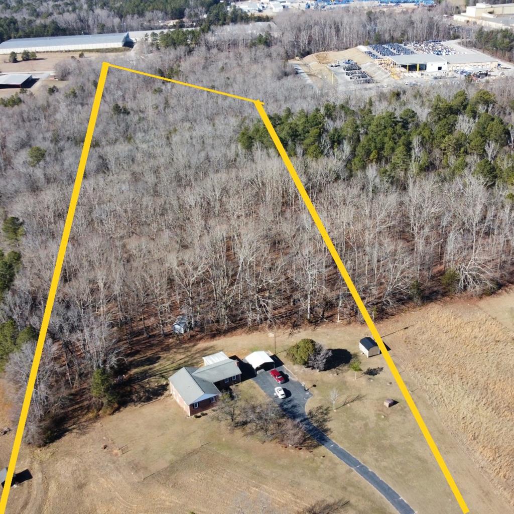 202 Wilton Road Abbeville, SC 29620 - Photo 35 of 35 This expansive property offers a private residence nestled amidst natural woodlands, providing serene views and ample space.