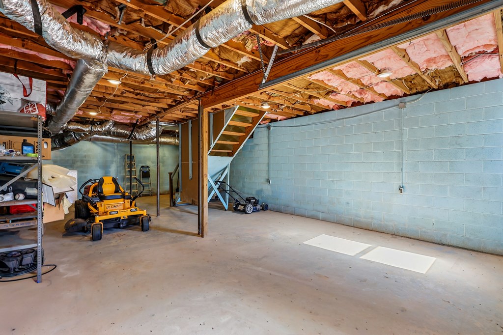 202 Wilton Road Abbeville, SC 29620 - Photo 10 of 35 This spacious unfinished basement offers ample storage and future expansion possibilities.