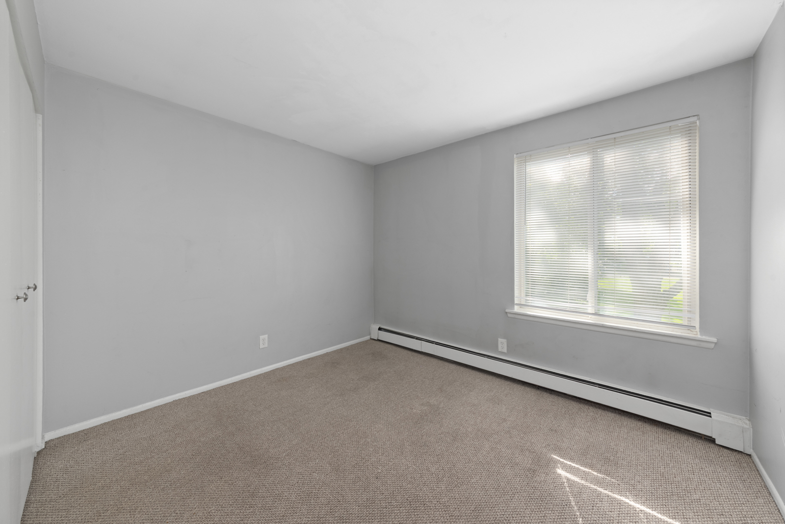 2400 Light Road, Unit 212 Oswego, IL 60543 - Photo 11 of 14 an empty room with windows