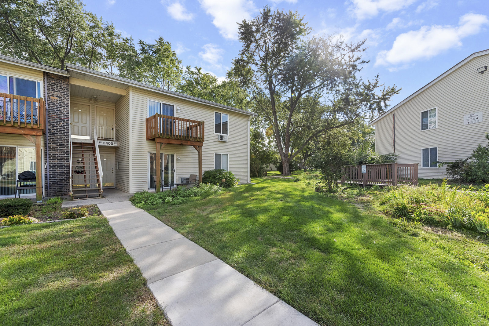 2400 Light Road, Unit 212 Oswego, IL 60543 - Photo 13 of 14 a front view of house with yard