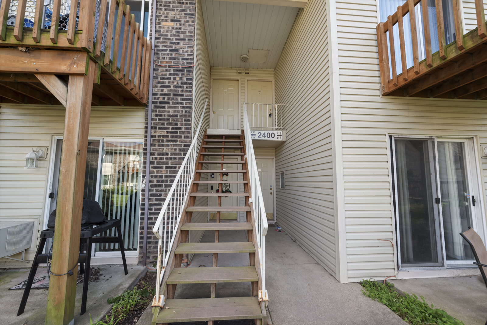 2400 Light Road, Unit 212 Oswego, IL 60543 - Photo 2 of 14 a view of entryway with a front door
