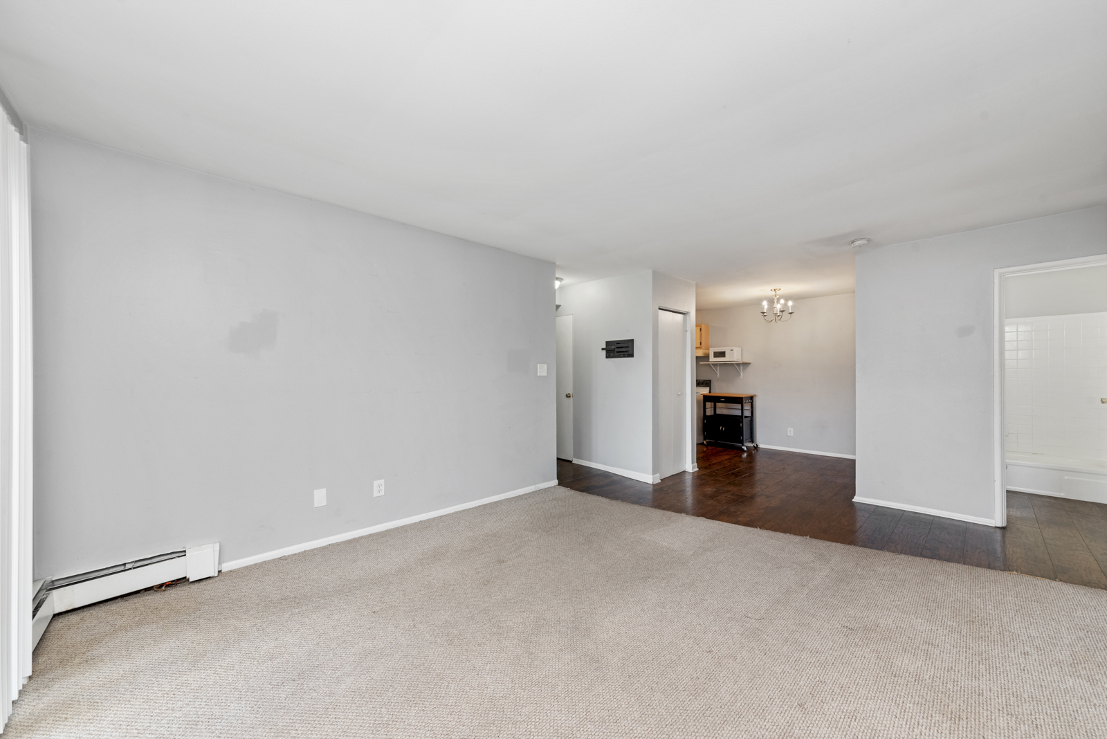 2400 Light Road, Unit 212 Oswego, IL 60543 - Photo 4 of 14 a view of a big room with closet and windows