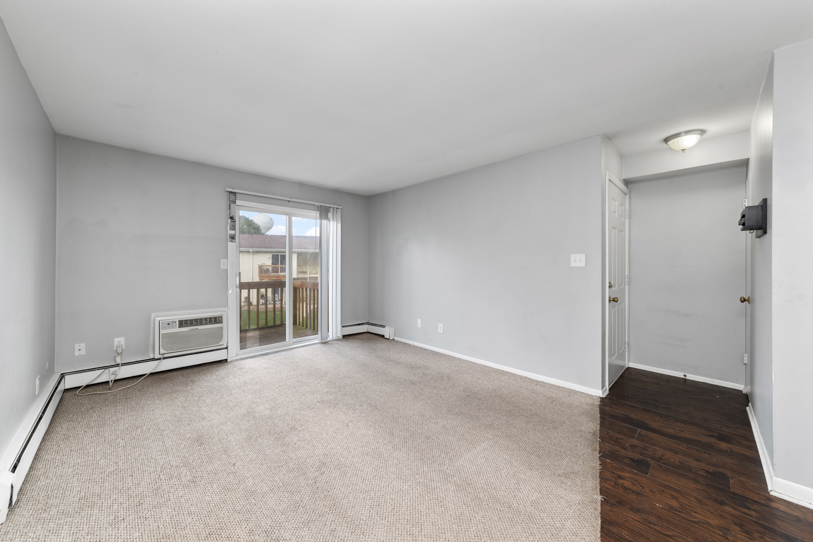 2400 Light Road, Unit 212 Oswego, IL 60543 - Photo 5 of 14 an empty room with windows