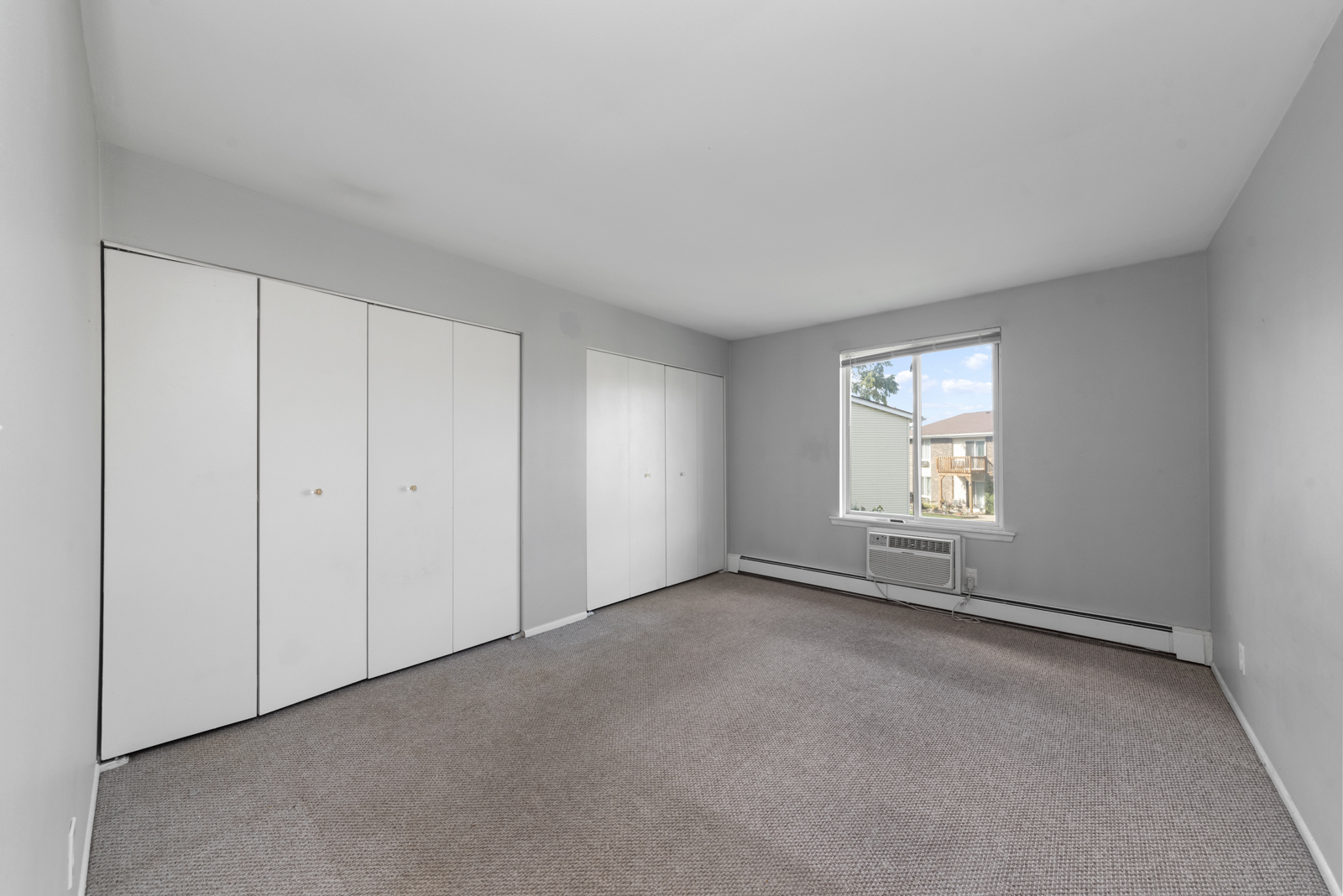 2400 Light Road, Unit 212 Oswego, IL 60543 - Photo 10 of 14 a view of an empty room with a window