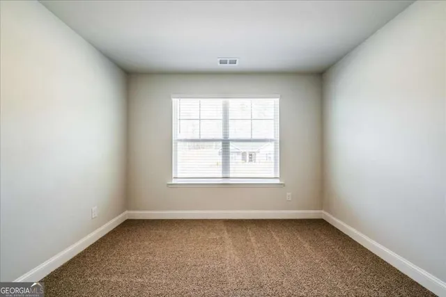 a view of a hallway with elevator