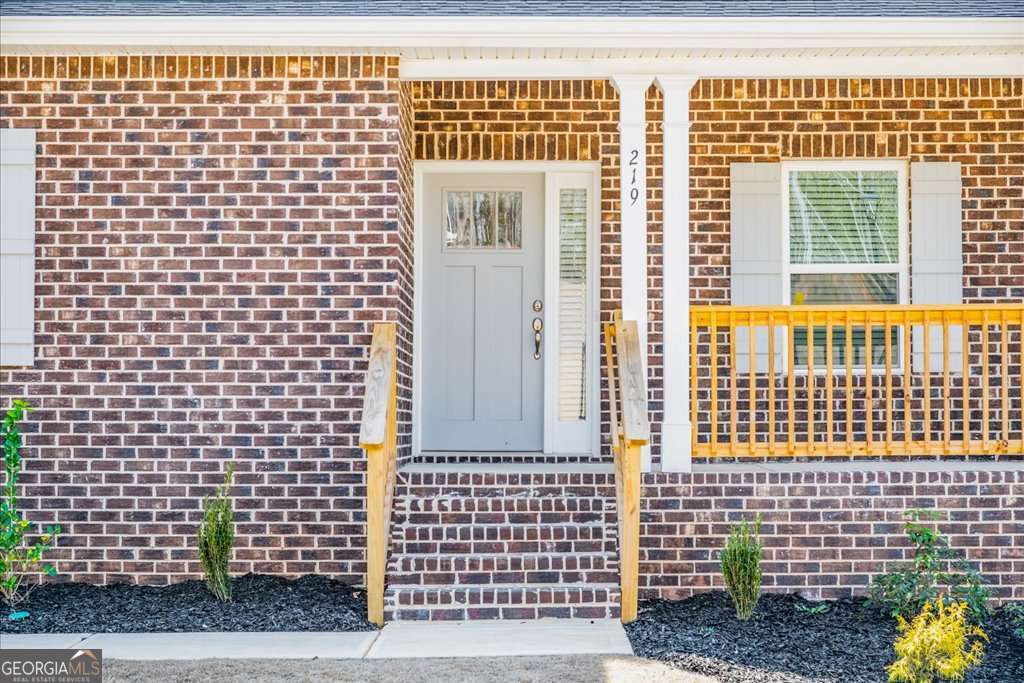 219 Carsons Walk Macon, GA 31206 - Photo 5 of 57 a view of a brick wall