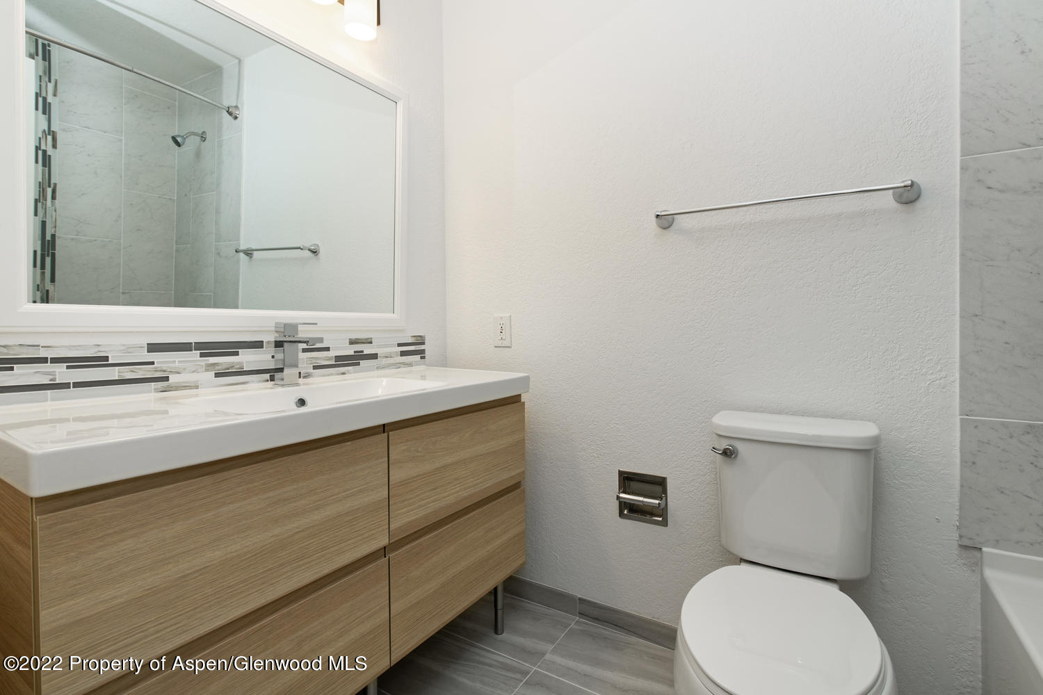 19 Pine Ridge Road Basalt, CO 81621 - Photo 16 of 16 a bathroom with a sink a toilet and mirror