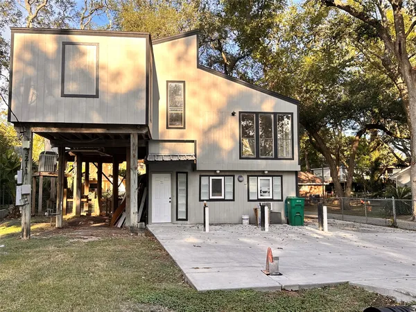 a front view of a house with a porch