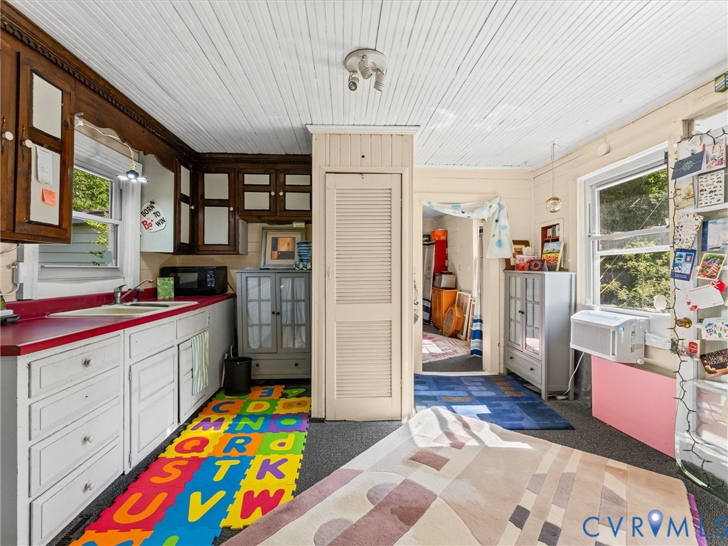 265 Signboard Road Bumpass, VA 23024 - Photo 17 of 39 Kitchen area featuring white beadboard ceiling and