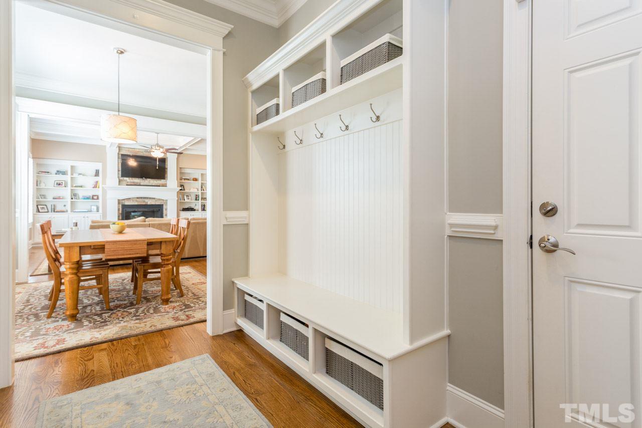 5012 Pomfret Point Raleigh, NC 27612 - Photo 21 of 25 The mudroom is located between the garage and the kitchen. This wonderful feature will keep your special ones organized!