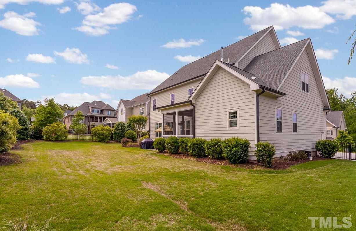 5012 Pomfret Point Raleigh, NC 27612 - Photo 23 of 25 Great backyard for fun and games. Nicely landscaped for privacy