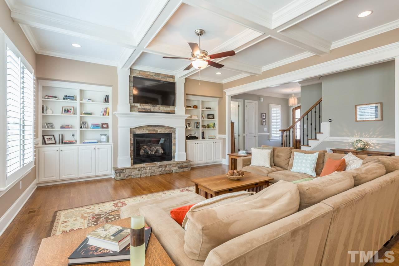 5012 Pomfret Point Raleigh, NC 27612 - Photo 4 of 25 You will appreciate the inviting stone fireplace that is framed by custom bookcases. Additional features include a coffered ceiling, plantation shutters, and hardwood floors.