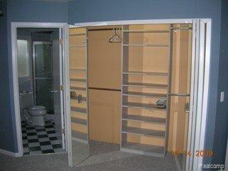 26 Regal Avenue, Unit 1 Rochester, MI 48307 - Photo 17 of 24 Master BR Closet_bathroom
