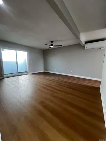 a view of an empty room and window