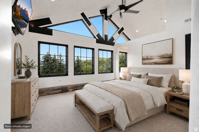 5971 Maple Ridge Trail Oakley, UT 84055 - Photo 28 of 43 Vaulted ceiling room with exposed black structural beams