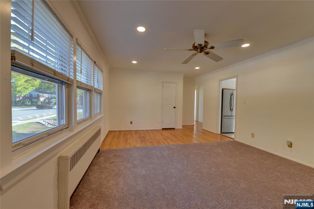 255 Bogert Road, Unit 2A River Edge, NJ 07661 - Photo 4 of 25 a view of an empty room with a window
